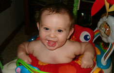 Happy Child in Baby Walker