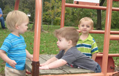 NEWLY-CHILDCARE1 Boys Playing on Jungle Gym