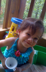 Girl Playing with Funnel