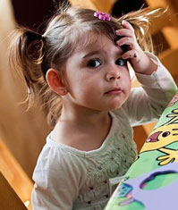 Girl Holding her Head