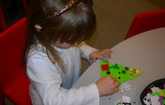 SCHOOLSECT-CLASSROOM-TIPS Girl making paper tree