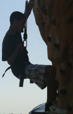 Sports_HikingClimbing Child rock climbing