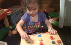 TREATMENT-HANDSPLINT3 Girl with Hand Splint Playing