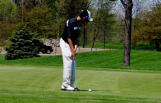 Man Playing Golf