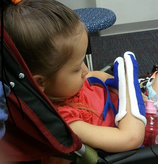 Girl with Hemiplegia Escaping from Constraint Therapy Brace